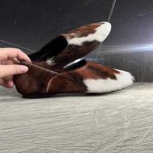 Brown and white cowhide leather slip-on loafers with...